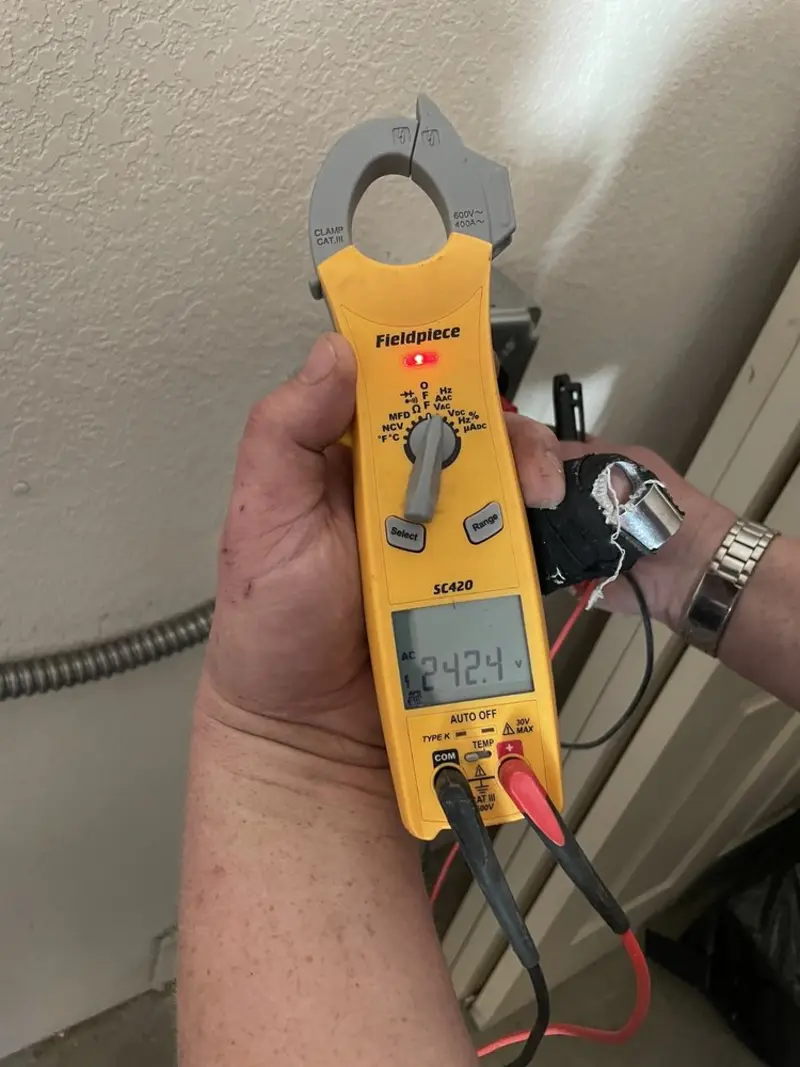 Voltage testing with clamp meter during Generator Installation in Yelm